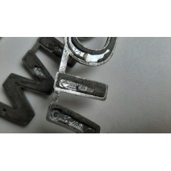 EMBLEMAT ZNACZEK KLAPY TYŁ NISSAN MICRA K12