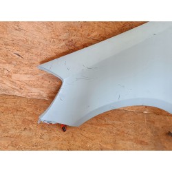 RENAULT CLIO III BŁOTNIK LEWY PRZÓD PRZEDNI 7701476102